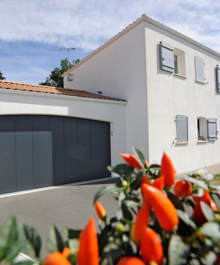 Confort, esthétique et sécurité pour votre porte de garage